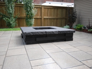 A "Graphix (Onyx Black) Fireplace" by "Techo-Bloc" was constructed and really complimented the Patio area of the "Allendale" (infill) project