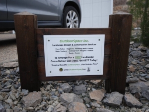 Our custom (cedar) sign makes a solid statement with respect to the "quality" work OutdoorSpace provides its valued clients