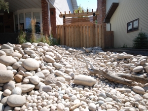 Another look at the "Dry River Bed'. We utilized "Athabasca River Rock" in order to create this beautiful "one of a kind" landscape feature