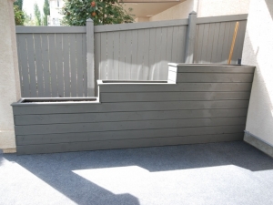 The "Tiered Planter" was constructed in order to hide an (ugly) concrete "wing wall" that extended out from the house